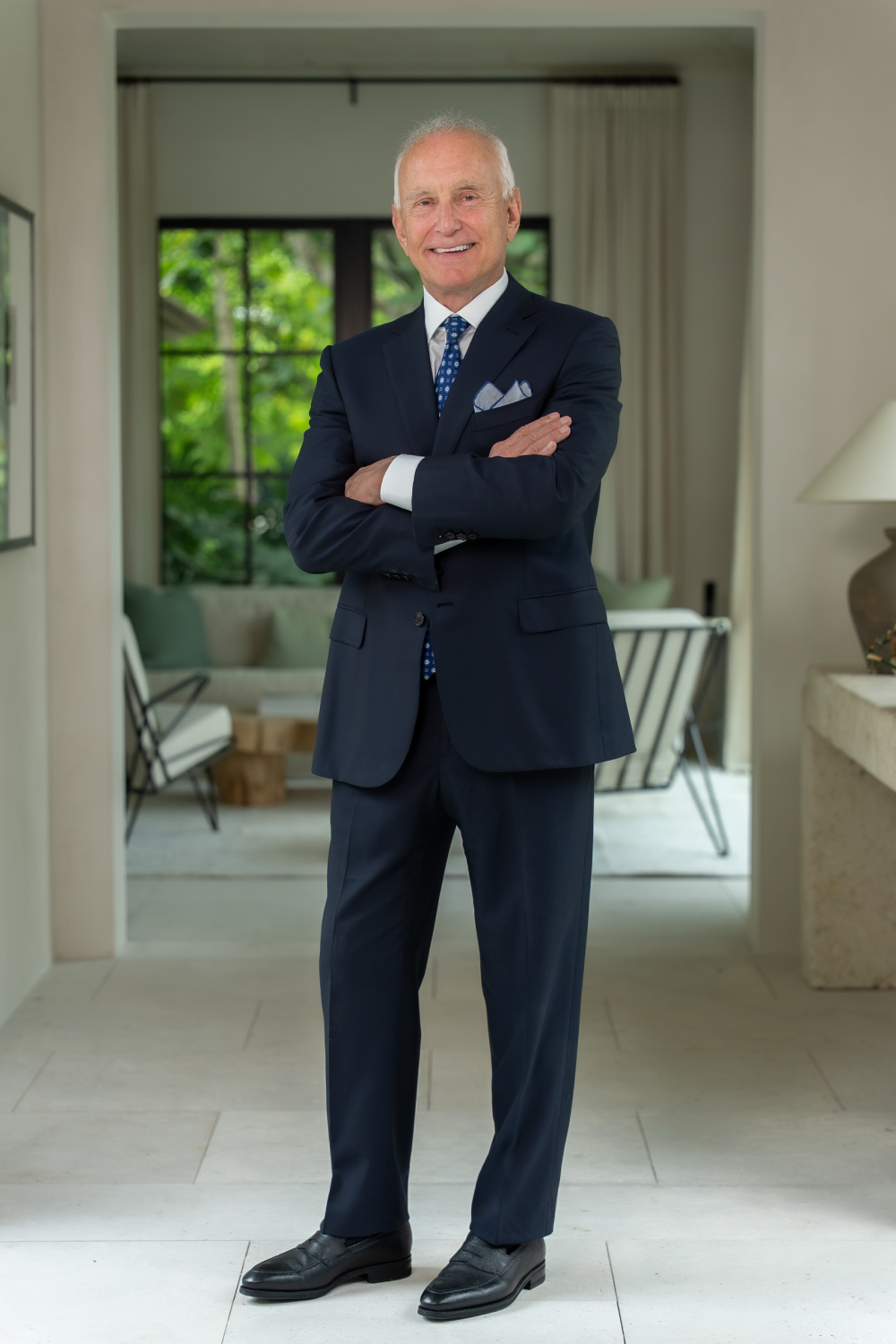 Jack Fiorella stands in a light-filled corridor of a luxury class-a property in Florida.